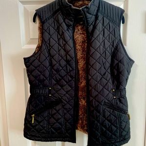 Black quilted vest with faux fur lining